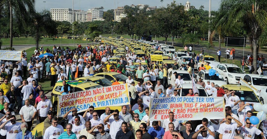 Taxi drivers protest against Uber in Rio de Janeiro